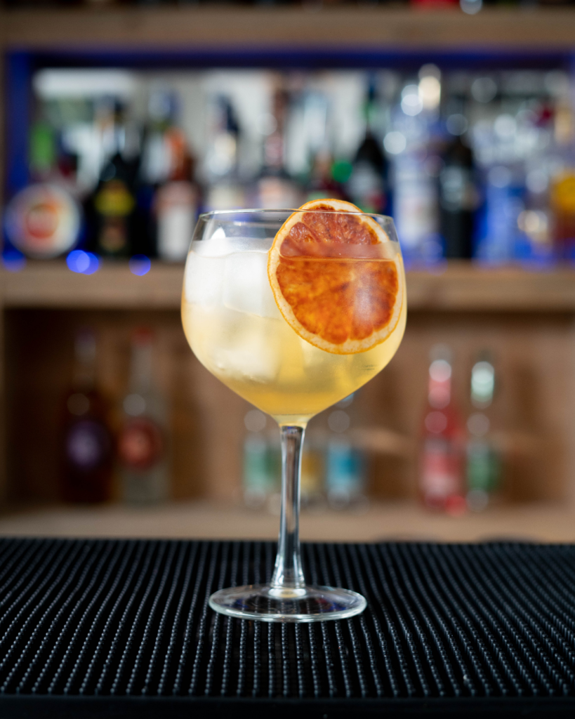 The Grand Tonic on a bar top.