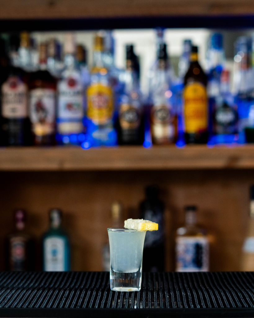 The Lemon Drop Shot on a bar countertop