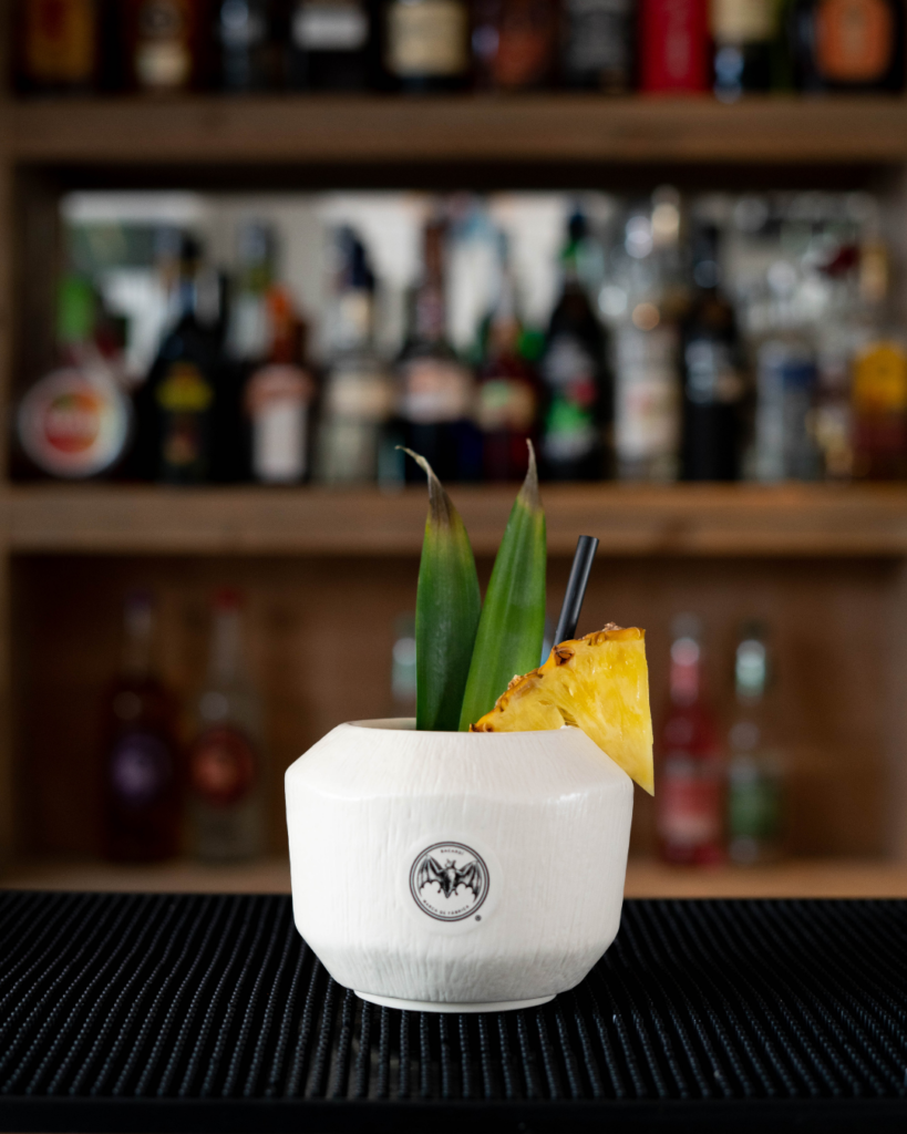 The Piña Colada on a bar top.