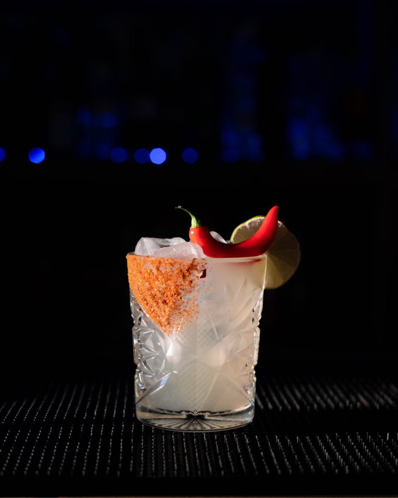 The Red Chili Margarita on a bar countertop.