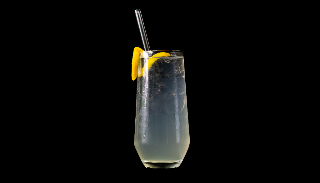 The Tom Collins on a homebar top with an all black background