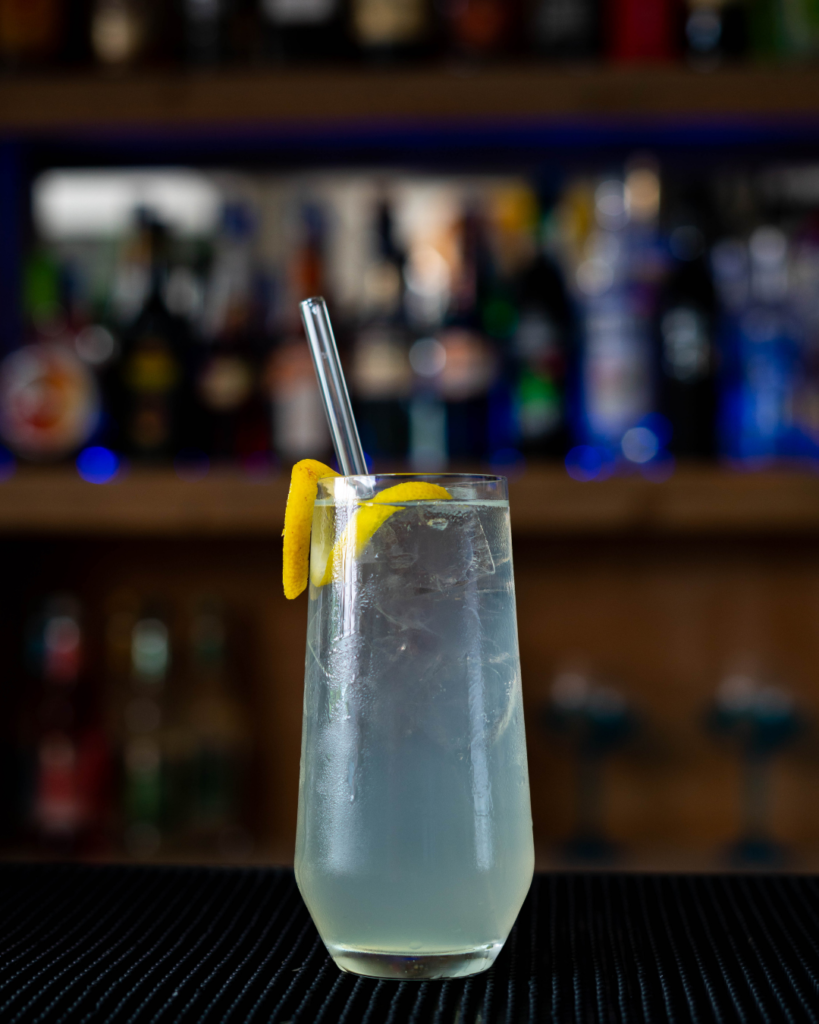 The Tom Collins on a bar countertop