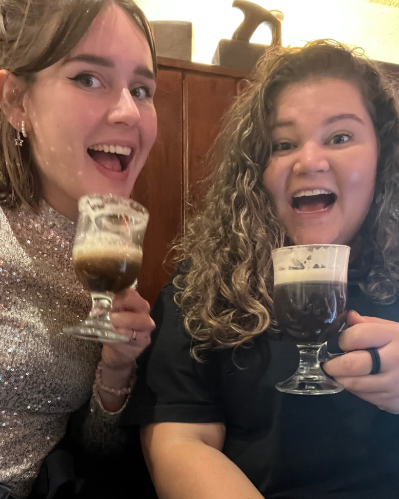 Britt & Joy drinking Award-winning Irish Coffee