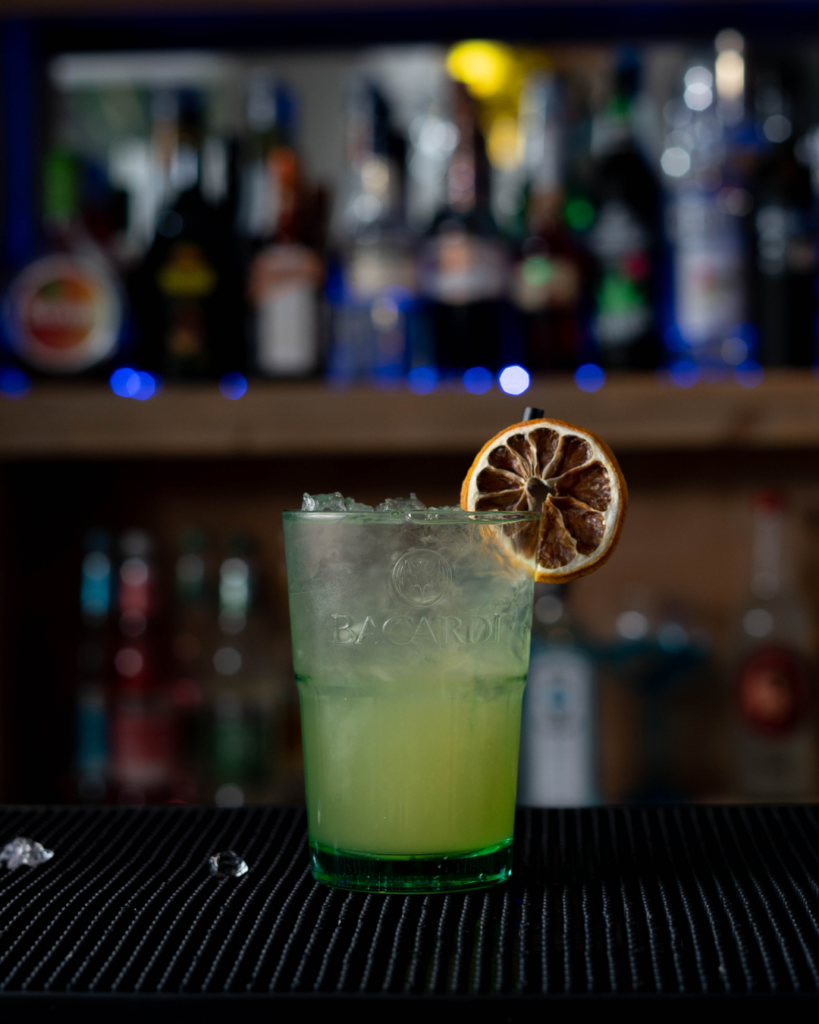 The Coco Colada Spritz on a bar top.