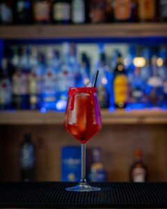 The Vampire's Kiss (Halloween themed drink) cocktail on a home bartop.