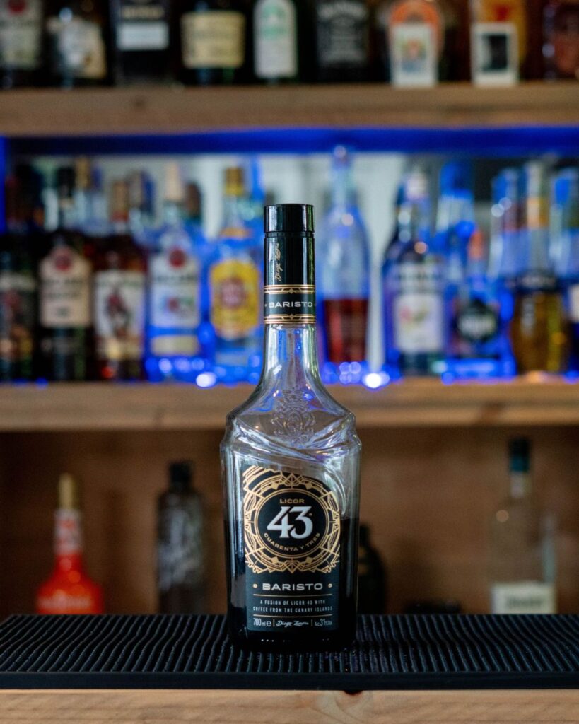 A bottle of Licor 43 Baristo on a bar top.