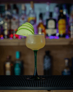 The Appletini on a home bartop.