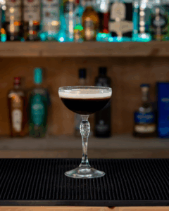 The Dominicana drink on a home bartop