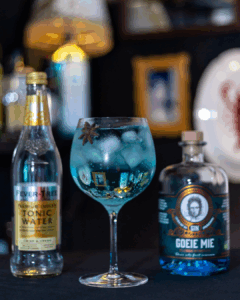 Goeie Mie Gin & Tonic with its Ingredients on a Home Bar top