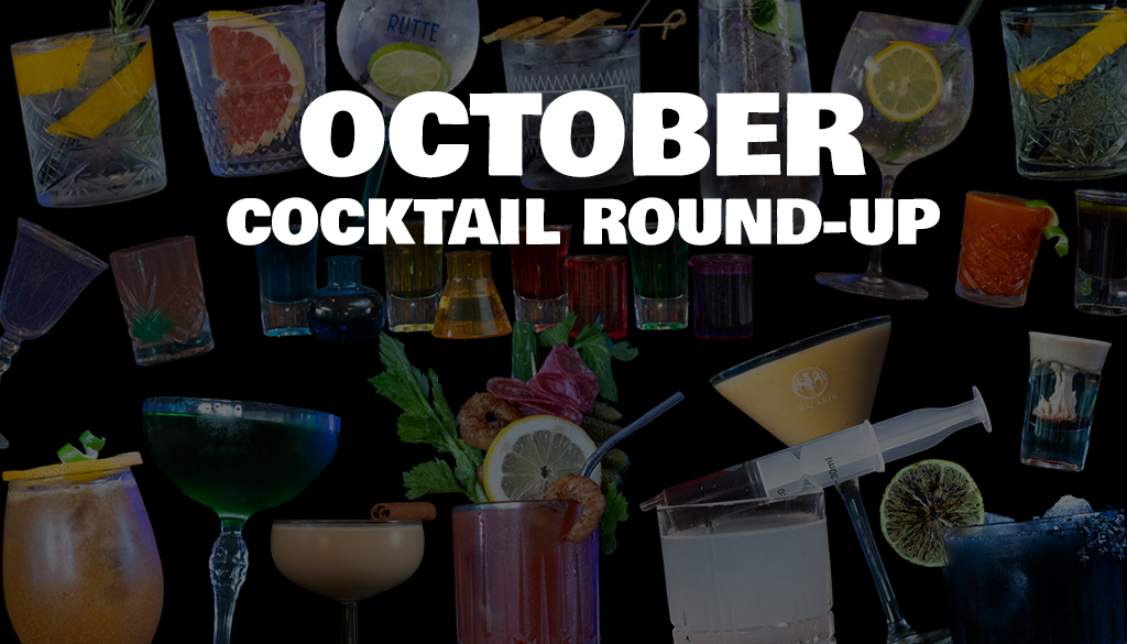 October Cocktail Round-Up with Halloween cocktails and shots, pumpkin pie martini, cinnamon roll martini, all on a home bar top with a black background