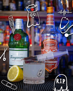 Bloody Gin Fizz Halloween cocktail on a homebar top. 