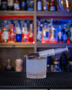 The Bloody Gin Fizz Halloween Cocktail on a home bartop.