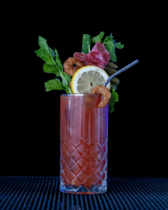 The Bloody Mary on a home bartop with a black background