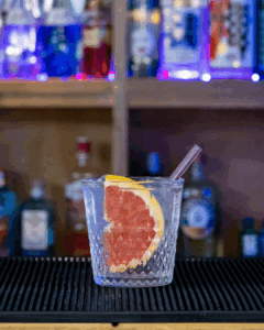 Empress 1908 Gin & Fever-Tree elderflower Tonic Water mixed on a home bartop.