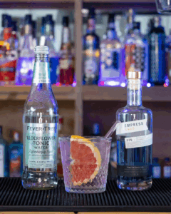 Empress 1908 Gin & Fever-Tree Elderflower Tonic Water mixed on a home bartop.