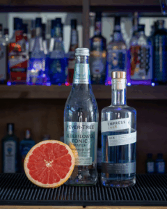 Empress 1908 Gin & Fever-Tree Elderflower Tonic Water mixed on a home bartop.