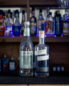 Empress 1908 Gin & Fever-Tree Elderflower Tonic Water mixed on a home bartop.