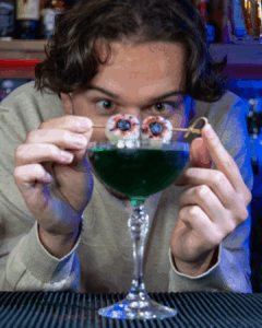 The Eye See You Halloween cocktail on a home bartop.