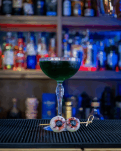 The Eye See You Halloween cocktail on a home bartop.