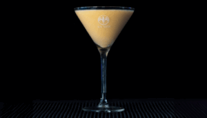 The Pumpkin Pie Martini with a black background.
