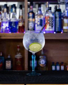 Gin & Tonic: Rutte Kaffir Lime Gin & Fever-tree Mediterranean Tonic mixed on a home bartop.