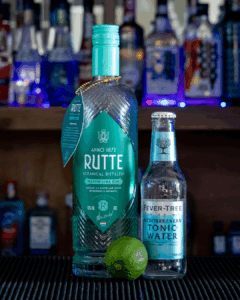 Gin & Tonic: Rutte Kaffir Lime Gin & Fever-tree Mediterranean Tonic mixed on a home bartop.