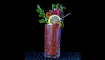 The Bloody Mary on a home bartop with a black background