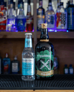 Black Forest Wild Gin & Fever-Tree Mediterranean Tonic Water on a home bartop.