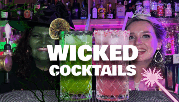 Wicked Inspired Cocktails on Elphaba and Glinda, standing on a Home Bar Top with people dressed up as the main characters of the Wicked For Good movie
