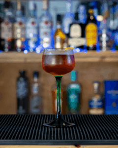 the Manhattan cocktail on a home bartop.