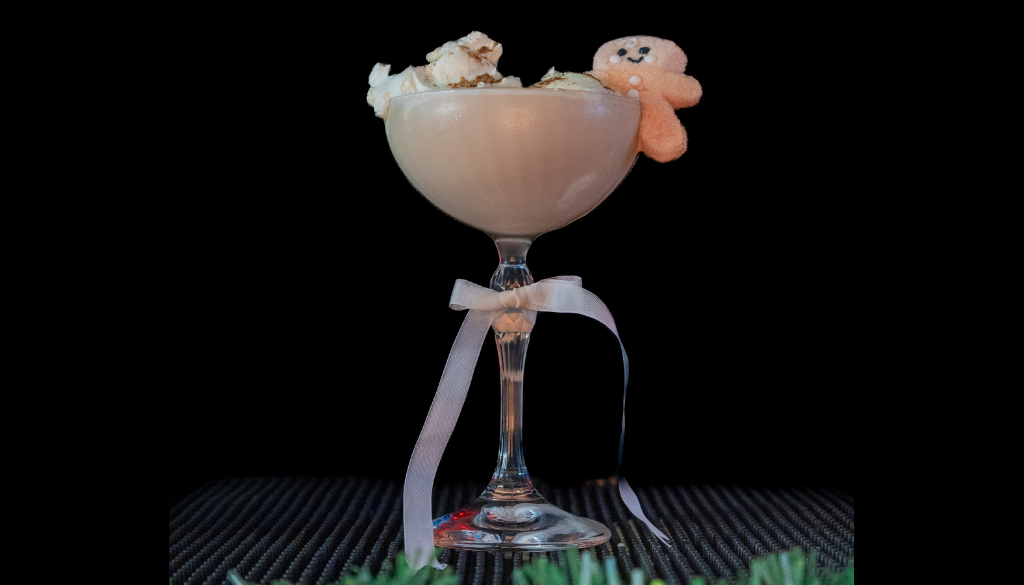 The Baileys Gingerbread Martini on a home bartop with a black background