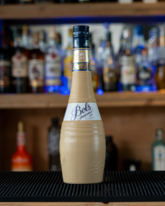 A Bottle of Bols Brown Cream Liqueur on a home bartop