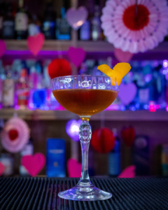 The Bridal Suite cocktail on a home bar top