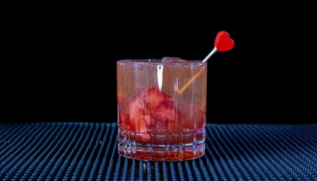 The Kentucky Kiss on a home bar top with an all black background