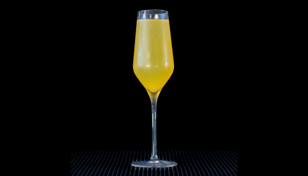 The Mimosa on a home bar top with an all black background