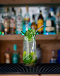 The cucumber mojito cocktail on a home bar top