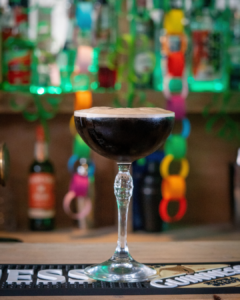 The Guiness Espresso Martini cocktail on a home bar top