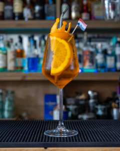 The Kingsday Spritz cocktail on a home bar top