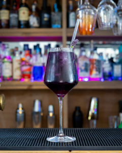 The Lavender Gin Spritz cocktail on a home bar top
