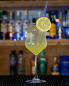 The Limoncello Spritz cocktail on a home bar top