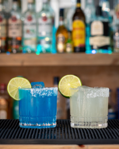 The Classic Margarita and the Margarita Azul cocktail on a homebar top.