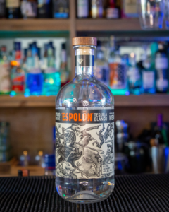 Espolon Tequila Blanco bottle on a home bar top