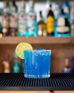 The Margarita Azul cocktail on a homebar top.