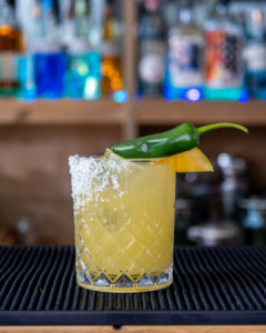 The Spicy Mango cocktail on a homebar top.
